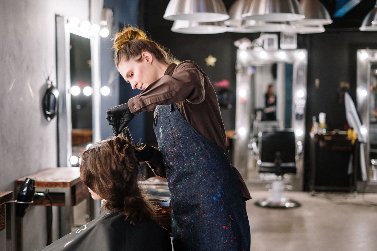 Stylist and client at the salon chair